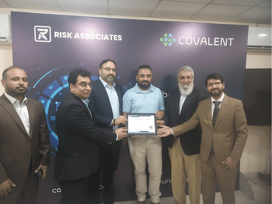 Mr. Aziz A. Rahim – Chief Operating Officer of Risk Associates presented the PCI DSS Certificate of Compliance to Mr. Imran Qureshi - CEO of Covalent & Mr. Shahzad Shahid – Director of Covalent, at the ceremony.