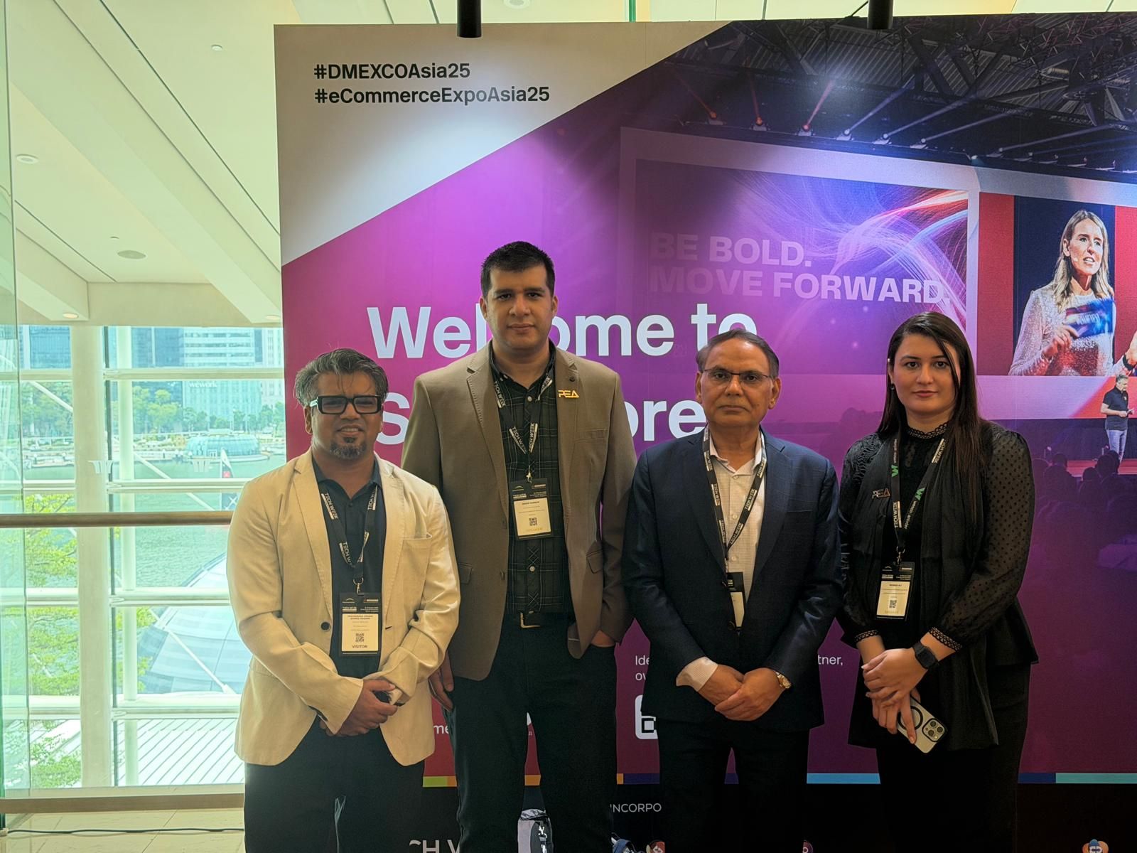 Group photo of Dr Aftab Rizvi with industry experts at Tech Week Singapore.